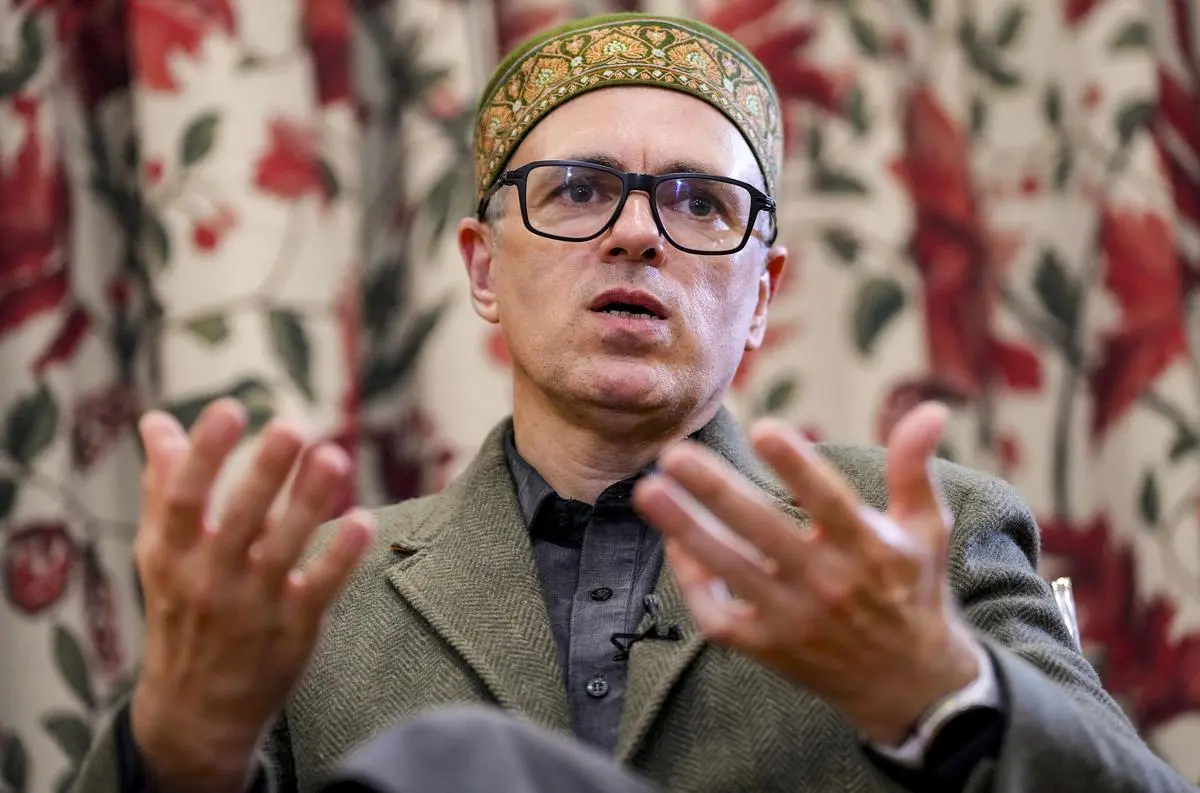Omar Abdullah speaking at a press conference