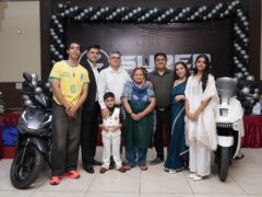 Launch event of Super Motors EV in Jammu showcasing electric scooters.